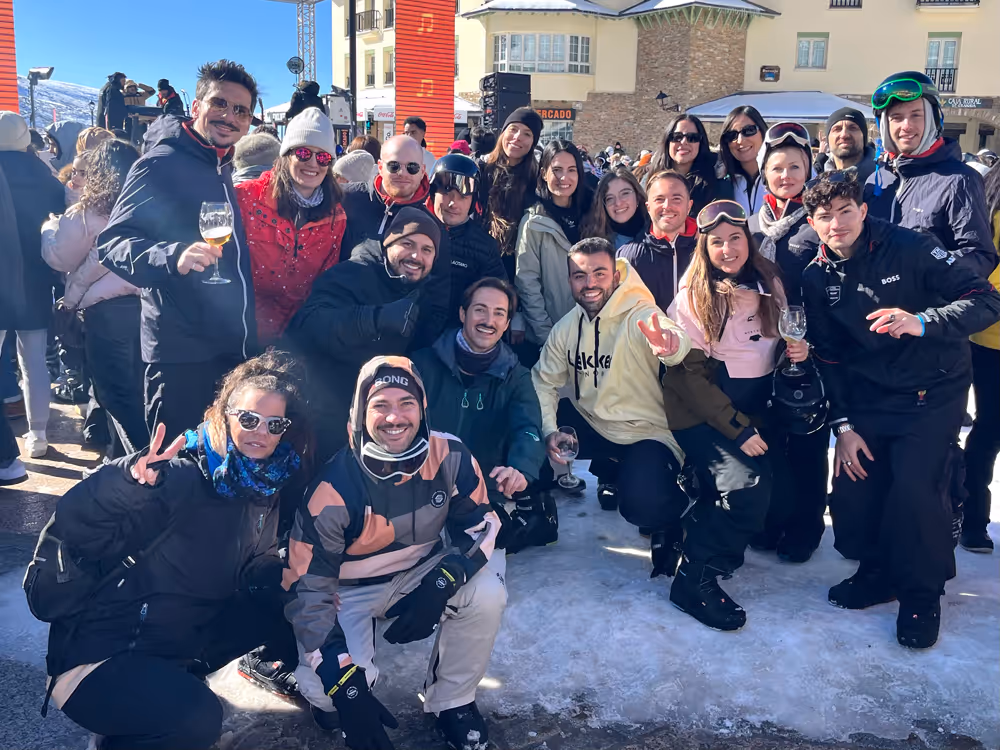 Group photo of employees on a ski trip