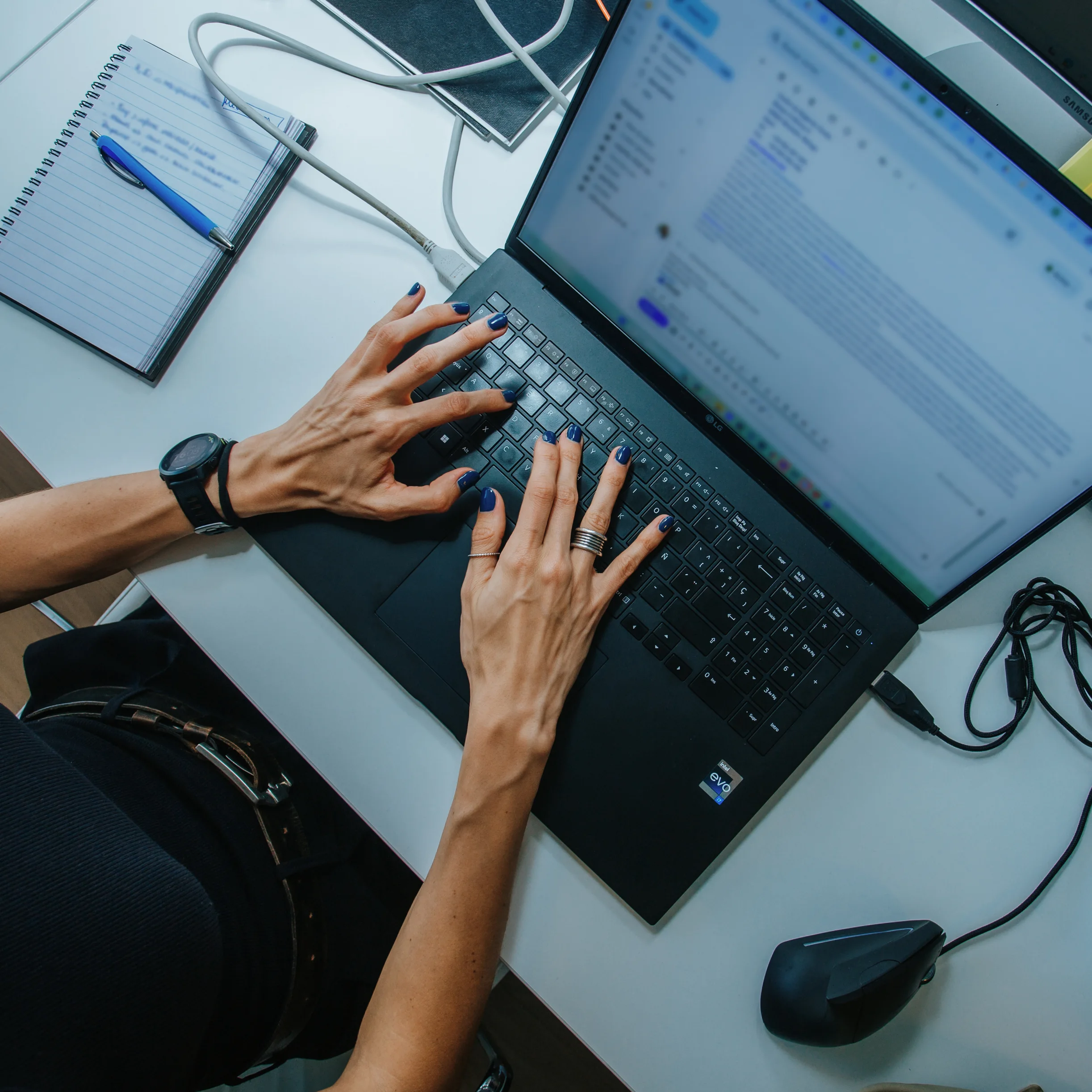 Employee typing on a computer