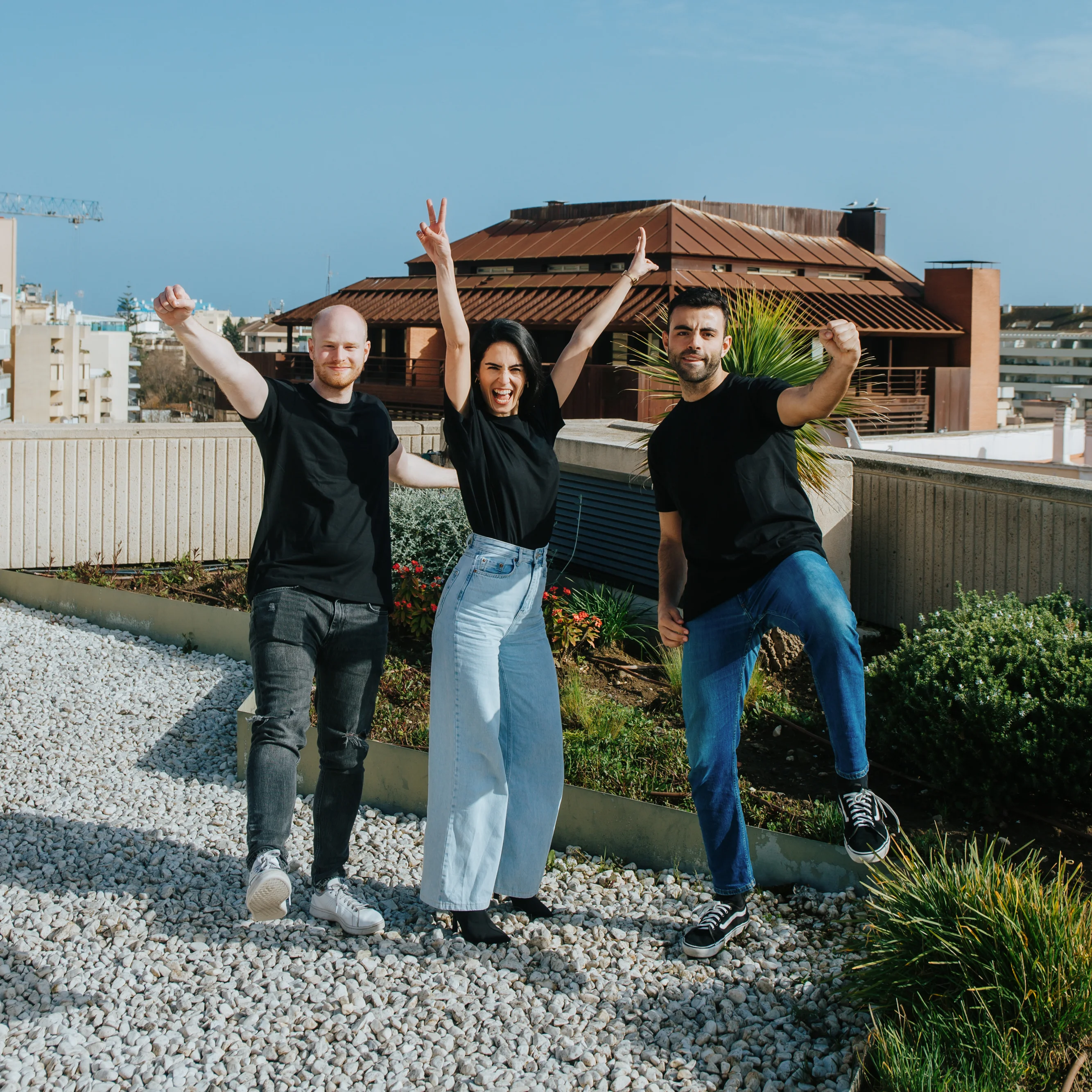 Group photo of three happy employees